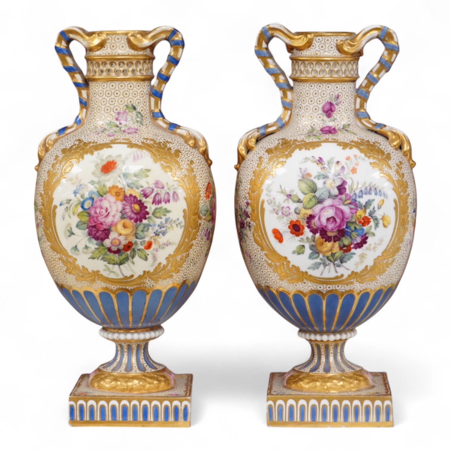 A pair of 19th century Sevres style porcelain vases hand painted with flowers, 22cm high